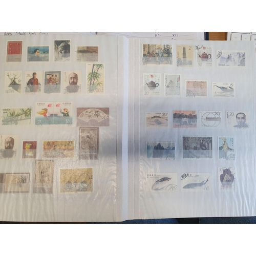 583b - A large stock book of Chinese Stamps.