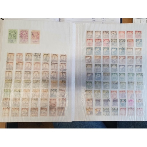 583b - A large stock book of Chinese Stamps.