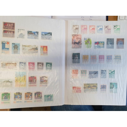 583b - A large stock book of Chinese Stamps.