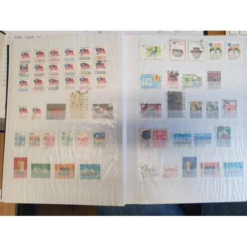 583b - A large stock book of Chinese Stamps.