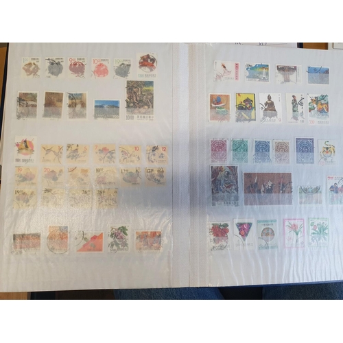 583b - A large stock book of Chinese Stamps.