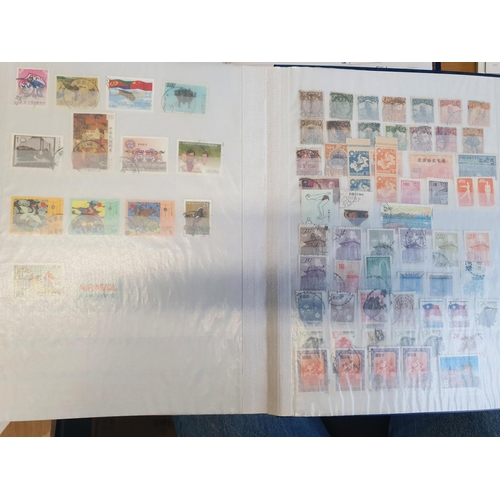 583b - A large stock book of Chinese Stamps.