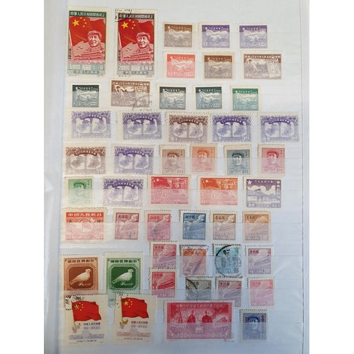 583b - A large stock book of Chinese Stamps.