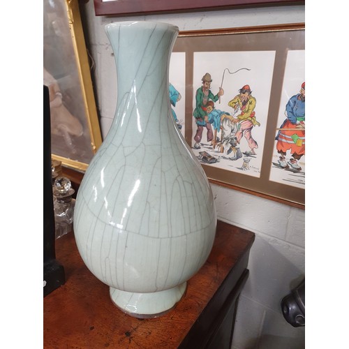 356 - Property of The 5 star Hotel. A large Duck Egg Blue/turquoise vase with aged effect.