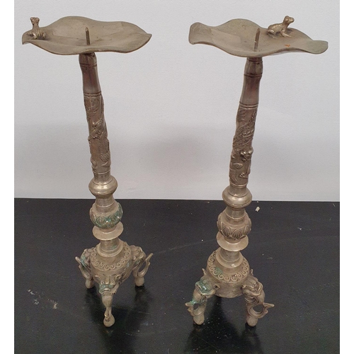 119 - SILK ROAD:  A pair of Metal Prickett Stands.39h cms.