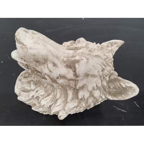 125 - A really well cast moulded head of a Wolf.36w x 43h cms.