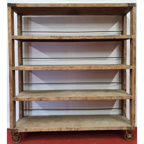 67 - A very large Open Shelving on wheels.188w x 45d x 207h cms.