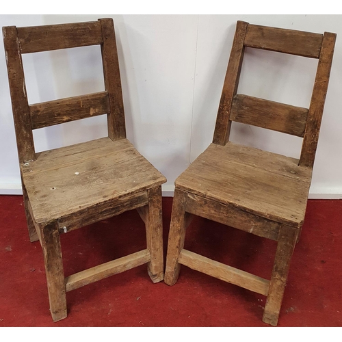 68 - A pair of Rustic Chairs.42w x seat h 41 cms.