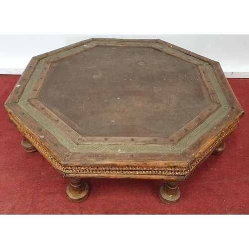 71 - A low Octagonal Table.71w x 71 x 17h cms.