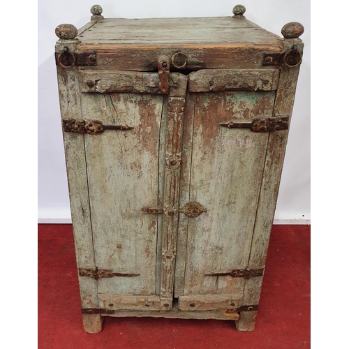 87 - FLOKI'S HUT: An old Timber two door Cabinet.57w x 54d x 104h cms.