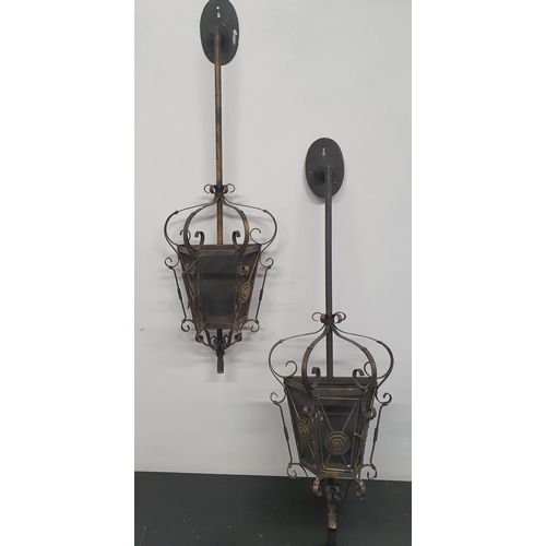 213 - A pair of Metal wall mounted Hanging Lights. (flat back).110h cms.