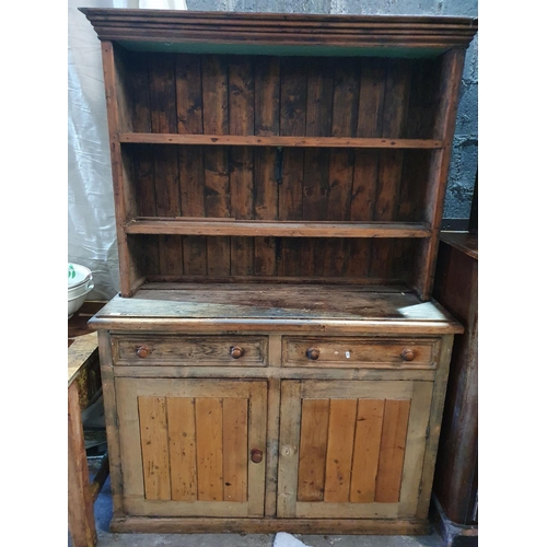 405 - A 19th Century Pine Dresser.131w x 45d x 193h cms.