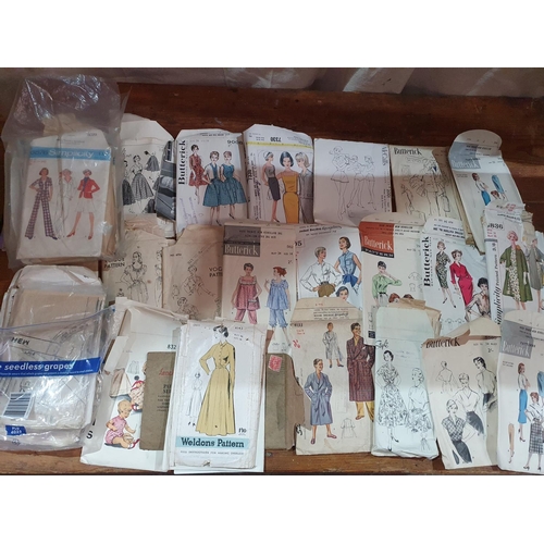 428 - A good quantity of Linen along with vintage Clothes Patterns.