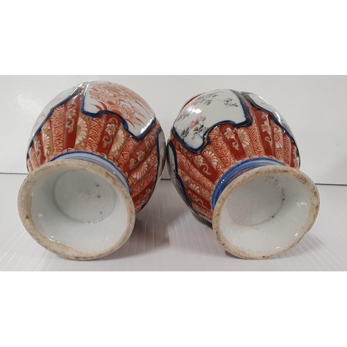 469 - A lovely pair of Imari style vases.18h cms.