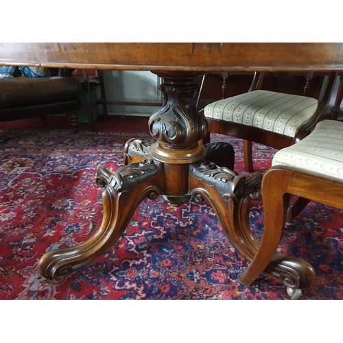 486 - A really good mid 19th Century Walnut oval Supper/Loo Table with scissors movement pod, a burr walnu... 