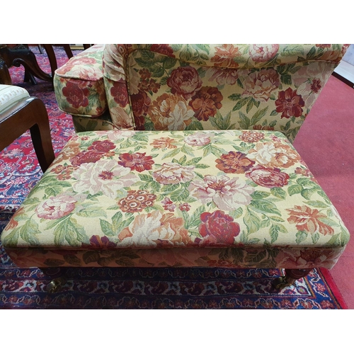 490 - A good three seater Couch, Armchair and Stool in a floral pattern. By Finline Furniture.