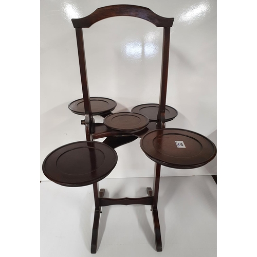 494 - A good Edwardian Mahogany Cake Stand with unusual mechanism.74h cms.