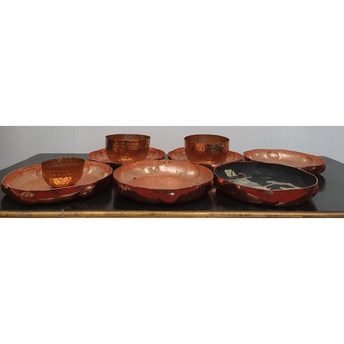 208 - SILK ROAD: A set off six large Copper Plates along with Copper Bowl.