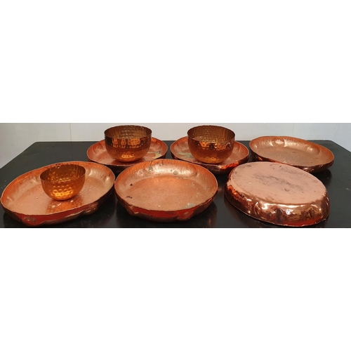 208 - SILK ROAD: A set off six large Copper Plates along with Copper Bowl.