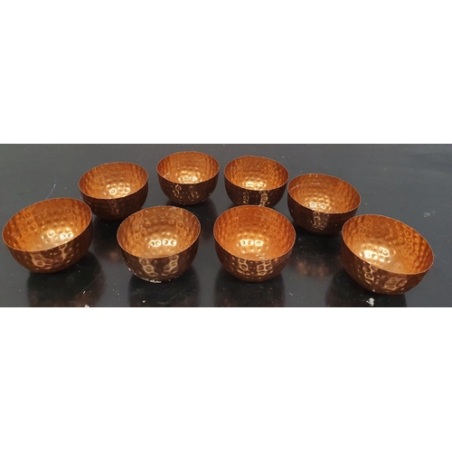 240 - SILK ROAD: A set of eight Copper Bowls.