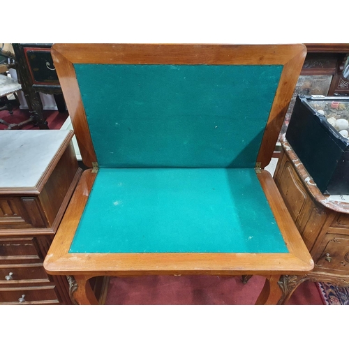 321 - A really good 19th Century rosewood & kingwood fold over Card Table with brass mounts profusely inla... 