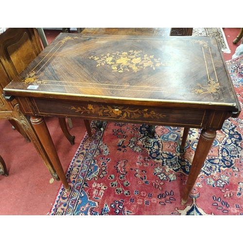 324 - A good rosewood and inlaid drop leaf table with brass edging.114w x 52 x 74h cms.