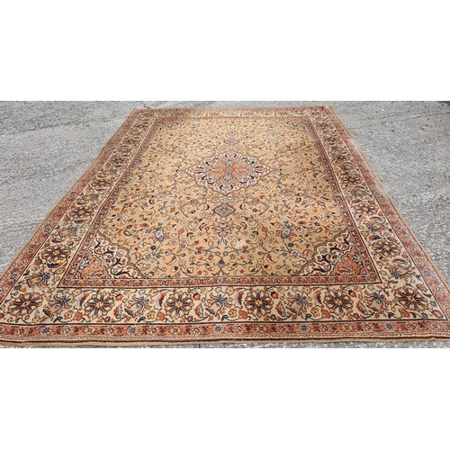 433 - A good brown ground Carpet. 360 x 275 cms approx.