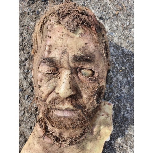 441 - A prop head of a dead Man.