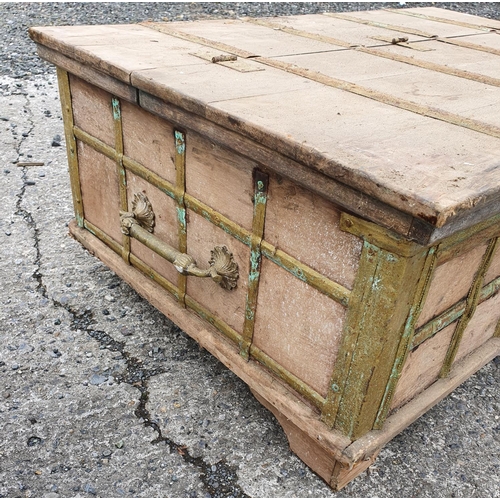 525a - A large metal bound timber Trunk/ Chest.110W X 74 X 44H cms.