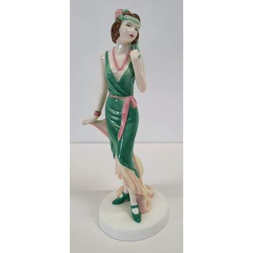 91 - A Royal Doulton Figure 'Julia' from the Pretty Ladies series. H 21 cms.