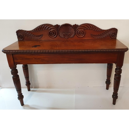 113 - A William 1Vth Mahogany Irish Side Table with a highly carved back.W 130 X 40 X H 77 cms.