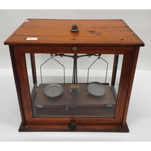 124 - A set of cased Brass Laboratory Scales by A. Gallenkamp, London with a set of weights.
W 46 X 27 X H... 