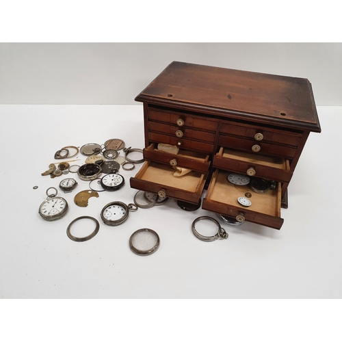 125 - A 19th Century Watchmakers Cabinet with ivory knobs, full of watch parts. W 30 X 20 X H 27cms.