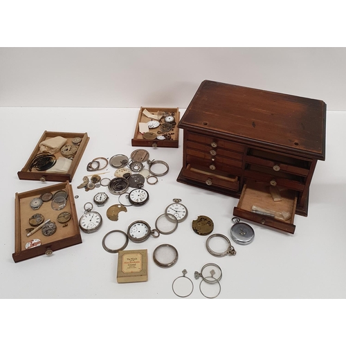 125 - A 19th Century Watchmakers Cabinet with ivory knobs, full of watch parts. W 30 X 20 X H 27cms.