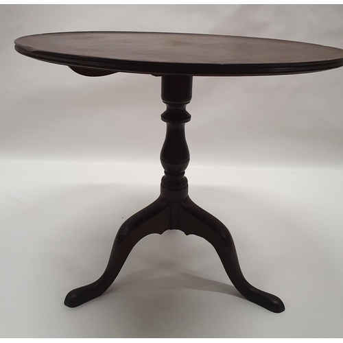 135 - A Georgian Mahogany Supper Table with simple tri pod base, with a slight silver table edge.  c1770 -... 