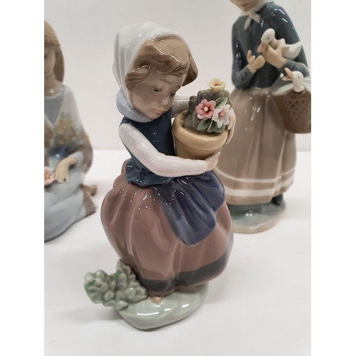 164 - Three Lladro Figures of girls.