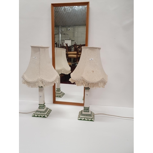 209 - Two Mirrors, a good pair of pottery Lamps along with two parasols.