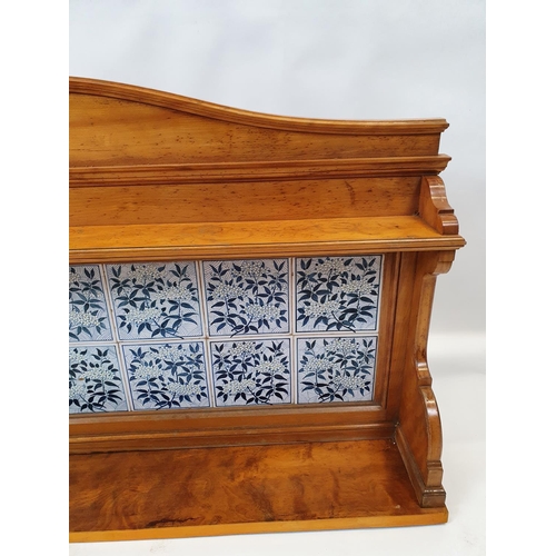 234 - A lovely late 19th Century Satin Birch wall Bracket with tiled back. W 135 X D 20 X H 66 cms.