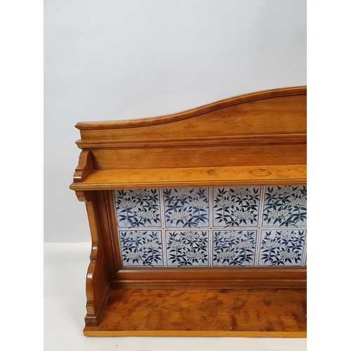 234 - A lovely late 19th Century Satin Birch wall Bracket with tiled back. W 135 X D 20 X H 66 cms.