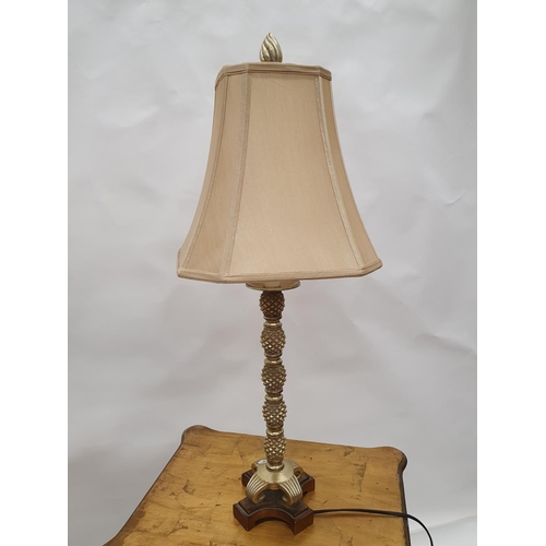 239 - A pair of side table Lamps with pineapple effect shaft and silk shades.H 76 cms.