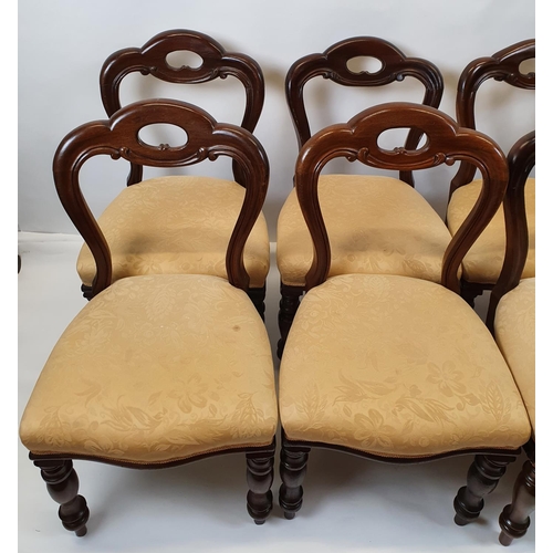 446 - A good set of eight mid 19th Century buckle back Dining Chairs with pierced backs and turned support... 