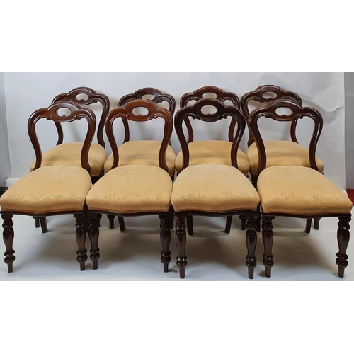 446 - A good set of eight mid 19th Century buckle back Dining Chairs with pierced backs and turned support... 