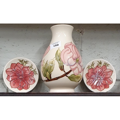 150 - A William Moorcroft Vase H 19cms along with two Moorcroft Pin Dishes D 11.5 cms..