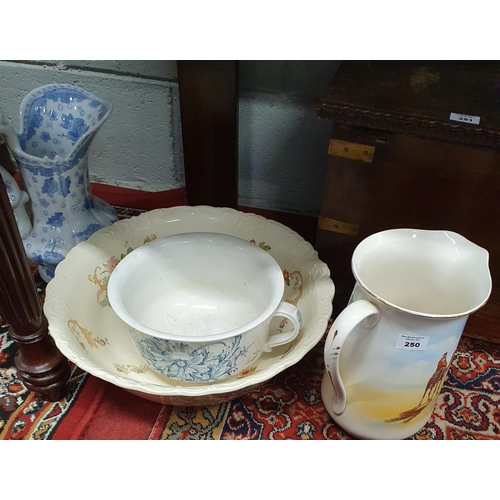 250 - A Falcon ware Bowl, a blue and white Jug along with a bowl and a po.