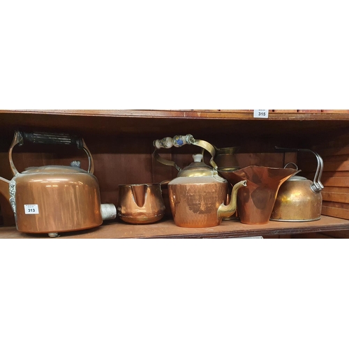 313 - A good quantity of Copper Kettles and other copper items.