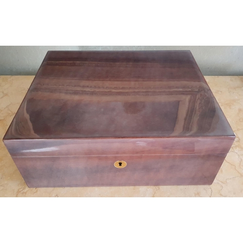 114 - A Mahogany Humidor and contents.