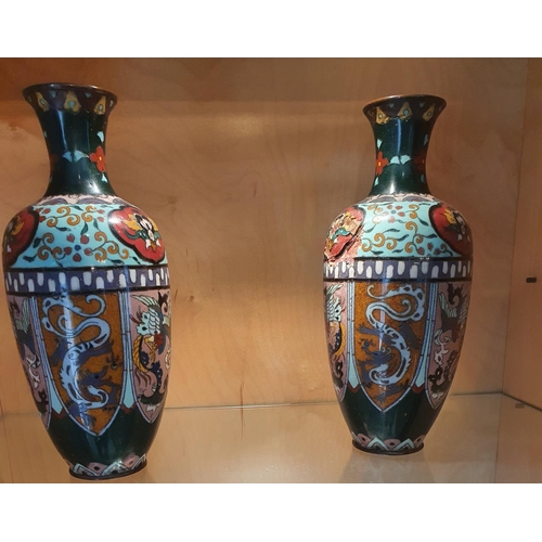 127 - A pair of 19th Century Cloisonné Vases with allover decoration. (slight damage).