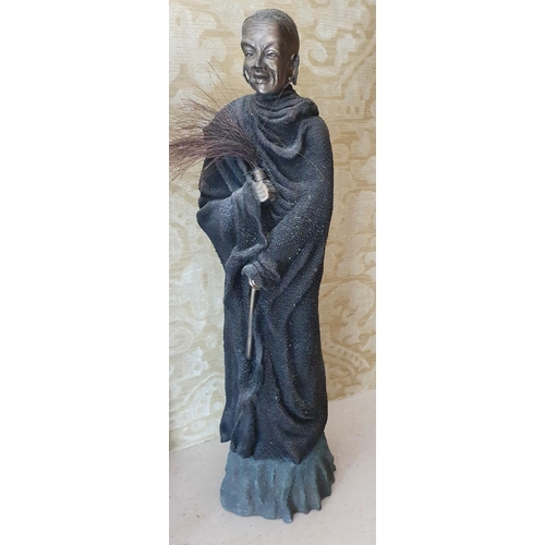 13 - Two African Figures. 53 cms high approx.