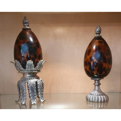 130a - A group of silver plated Centerpieces with a tortoiseshell effect glass center along with other item... 