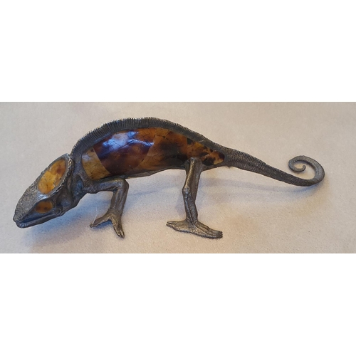 162 - A decorative figure of a Lizard. 34 cm long.